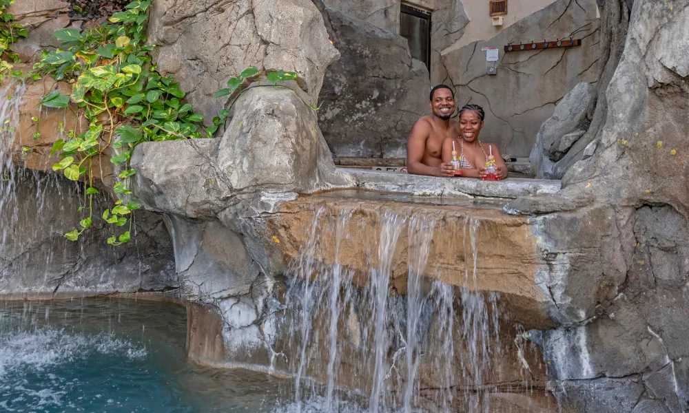 Couple in the jacuzzi at Biosphere Pool Complex