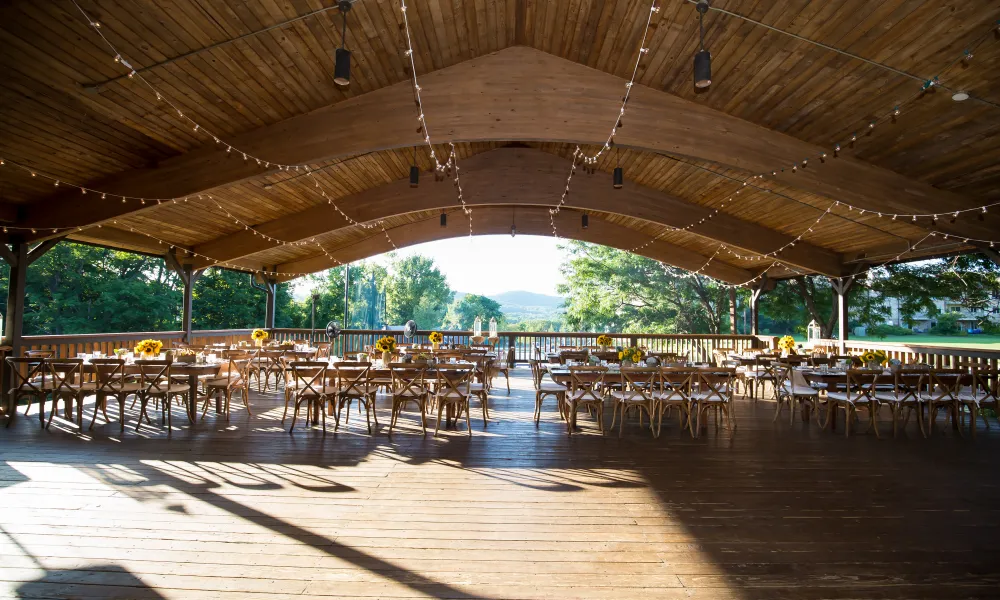 Inside view of Sweetgrass Pavillion with tables and chairs