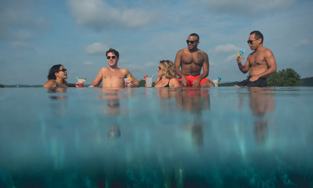 Group of friends in vista 180 pool.