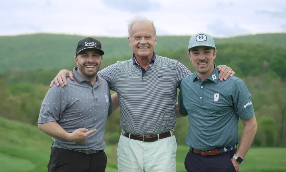 Kelsey Grammer standing with two men