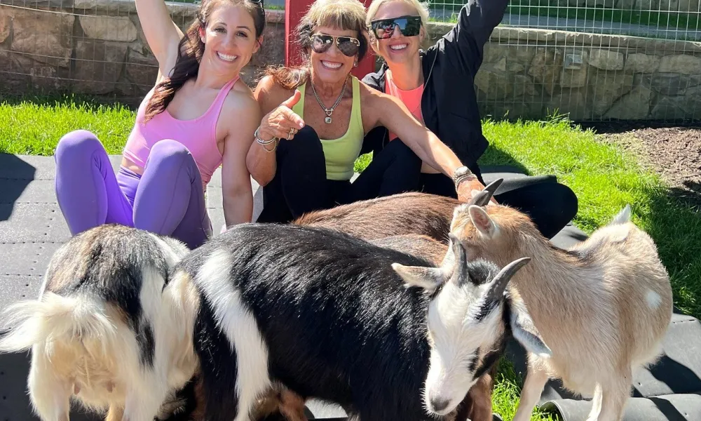 Group of women with goats.