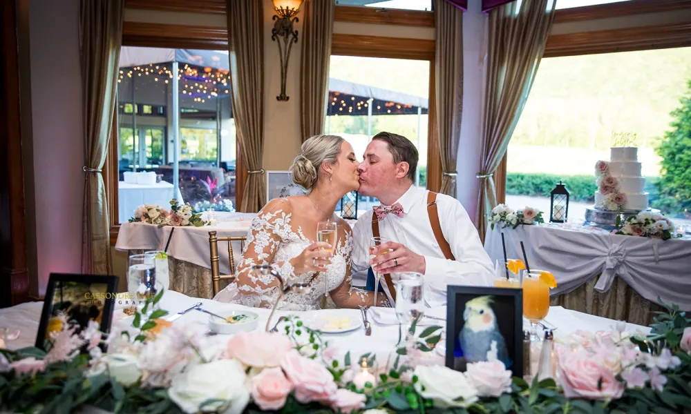 Bride and Groom kissing.