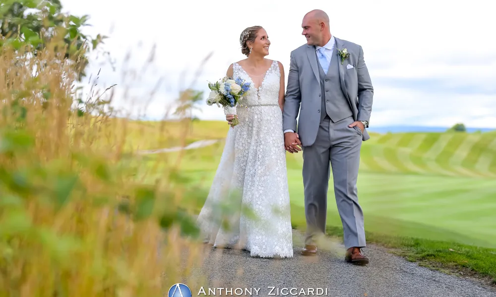 Bride and Groom walking the grounds at Ballyowen Golf Course