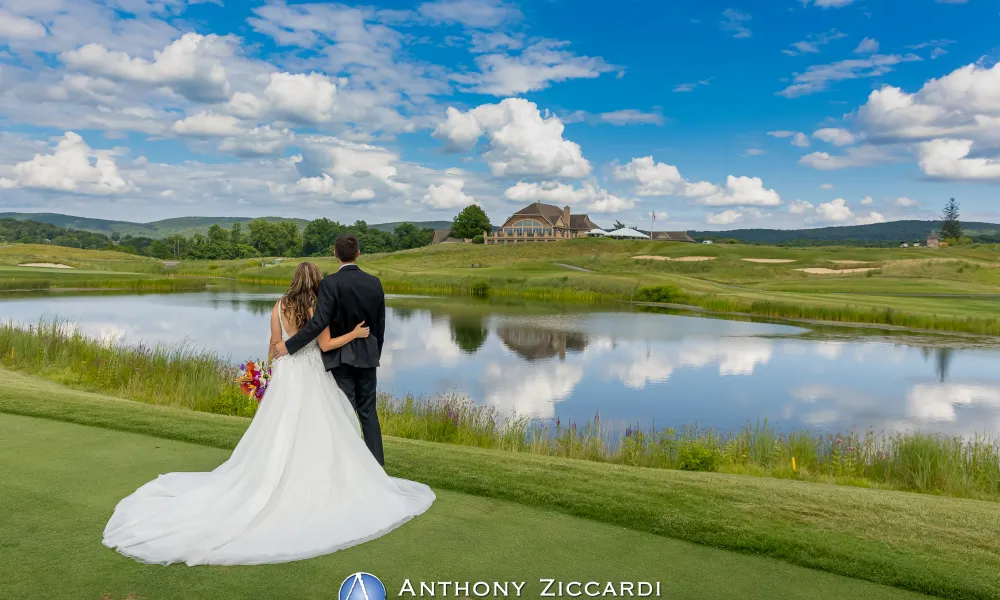 Wedding couple overlooking the golf course at Ballyowen