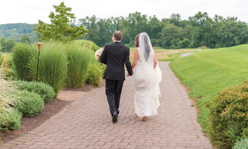 Wedding couple walking the grounds at Ballyowen Golf Course