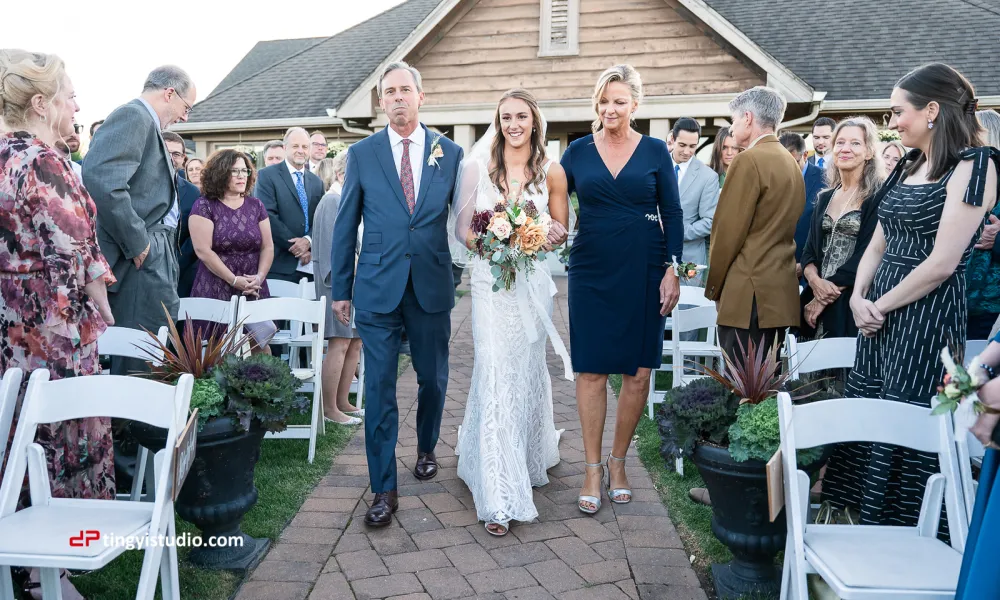 Beautiful bride walking down the aisle