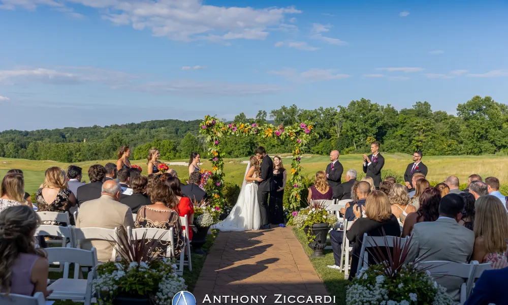 Couple kissing at wedding ceremony