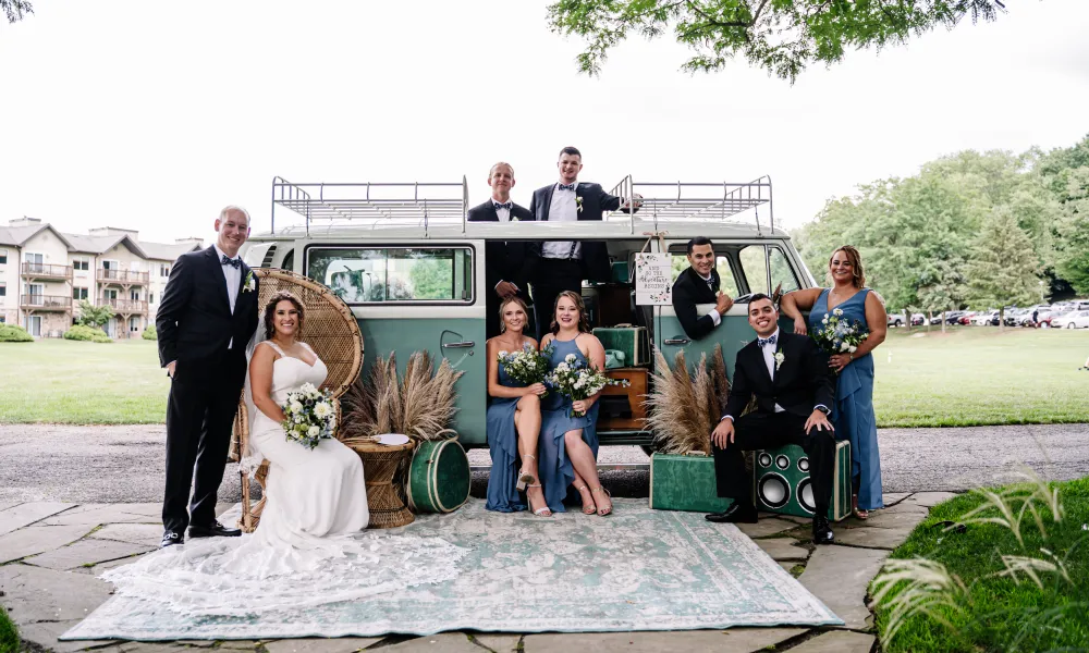 Wedding party sitting in green VW van