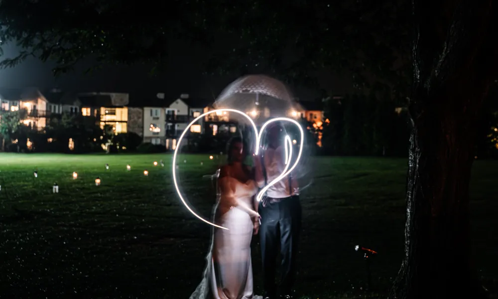 Bride and groom surrounded by a heart