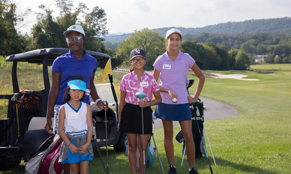 Girls at golf clinic at Crystal Springs Resort