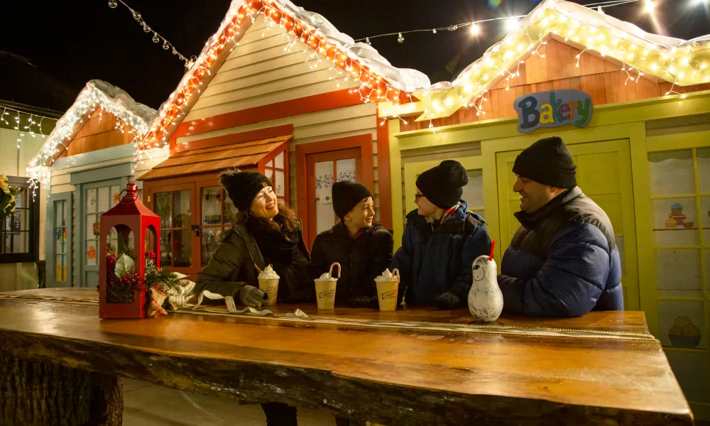 Family drinking hot chocolate at Frosty's Cantina