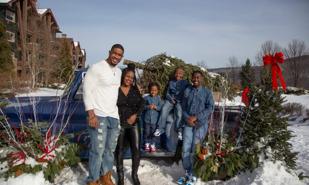 Family Christmas photo at Crystal Springs Resort truck