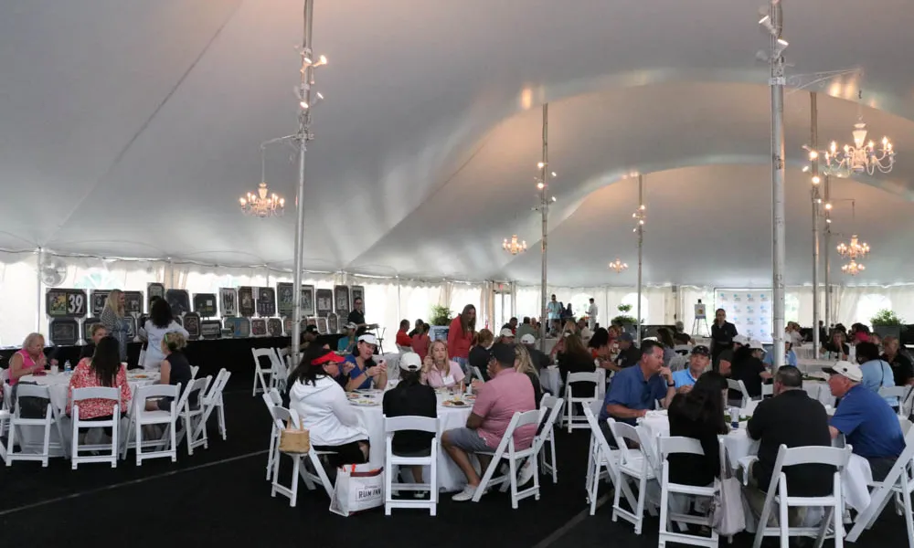 Large event in a tent taking place at Crystal Springs Resort