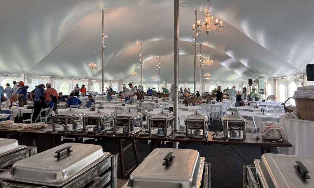 A food buffet display in an event tent