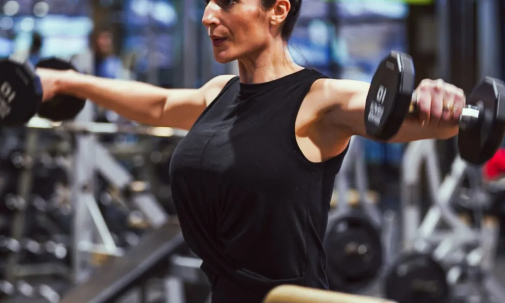 Woman lifting weights.