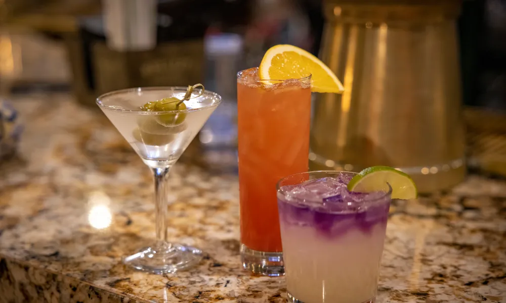 Counter of various cocktails from Kites Restaurant bar