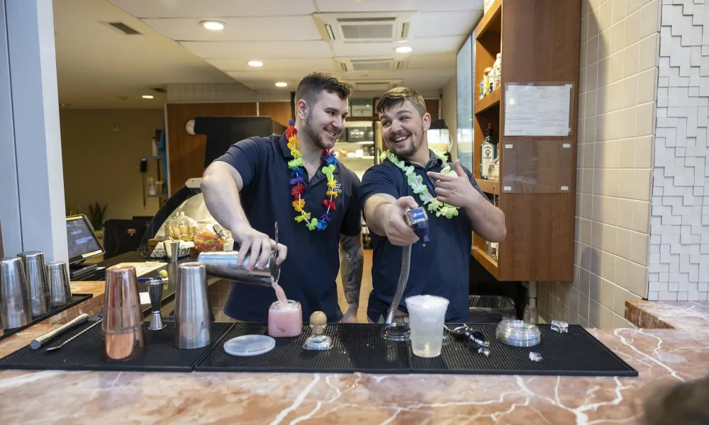 Bartenders making drinks