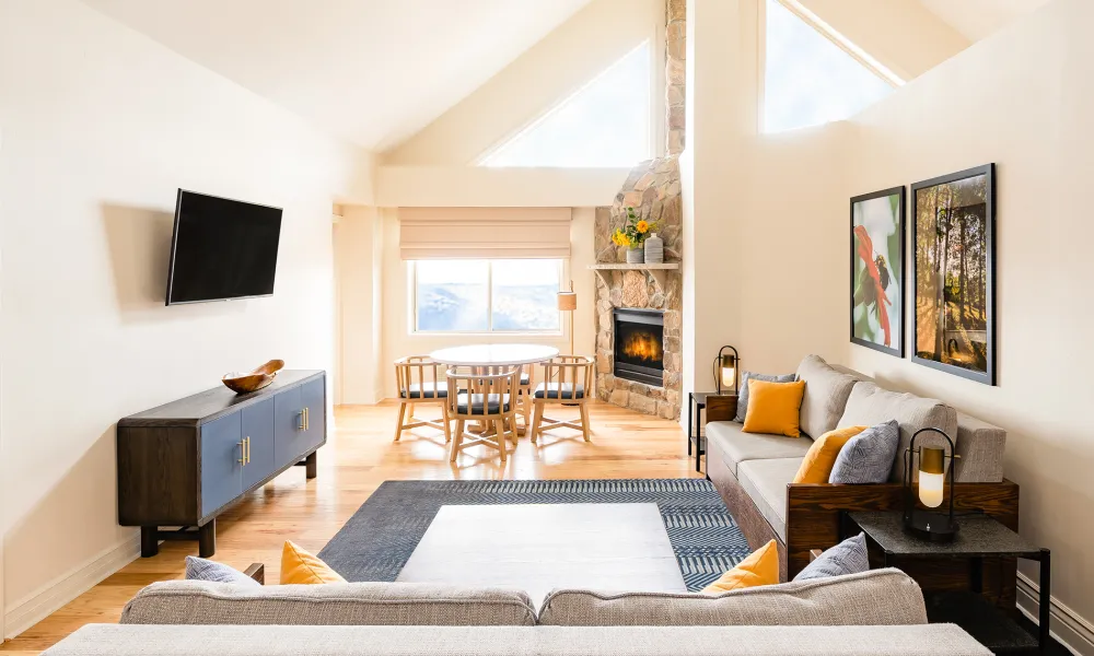 Living Room and Dining Area in 2 Bed 2 Bath Suite at Grand Cascades Lodge