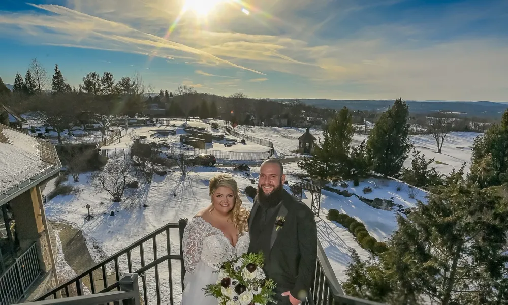 Bride and Groom from a winter wedding with a view of the valley from the Crystal Springs Clubhouse.