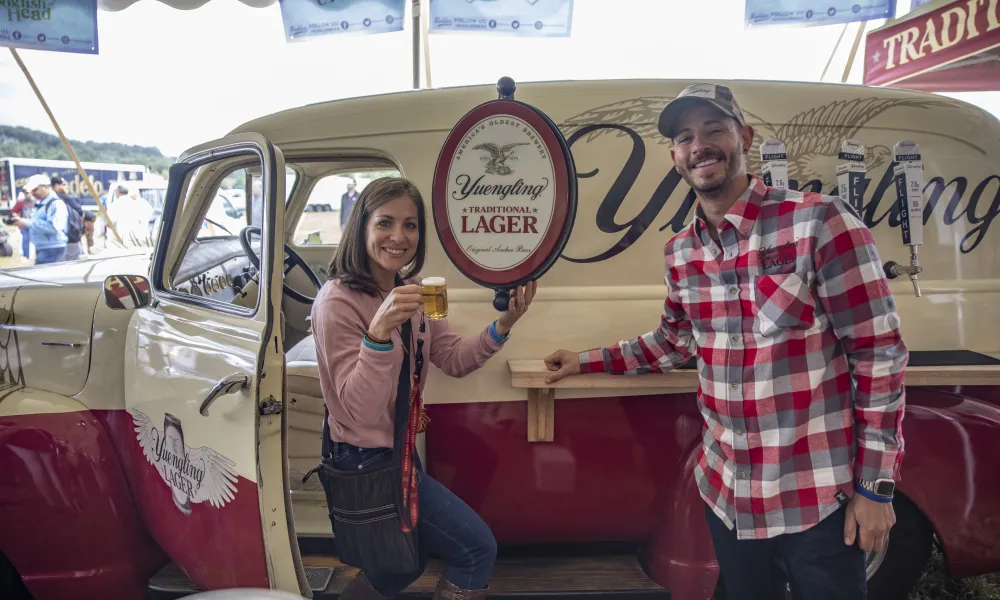 Couple at the Yuengling Lager truck at the NJ Beer &amp; Food Festival