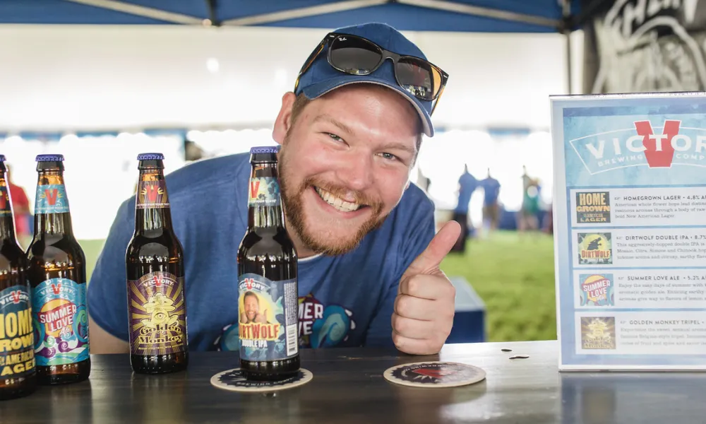 Guy drinking Victory beer at NJ Beer &amp; Food Festival