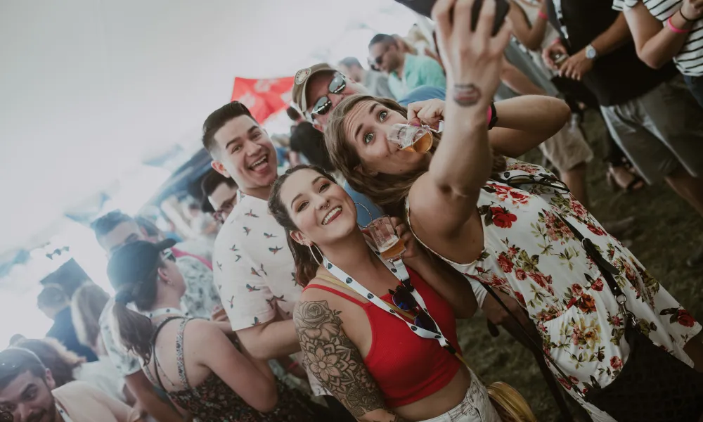 Group of friends drinking beer at NJ Beer &amp; Food Festival