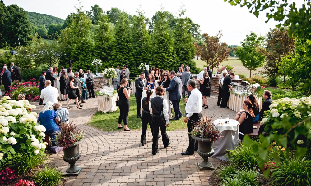 Wedding guests enjoying an order cocktail hour.