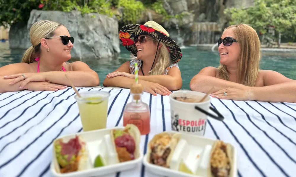 Girlfriends in Biosphere pool with tacos and tequila.