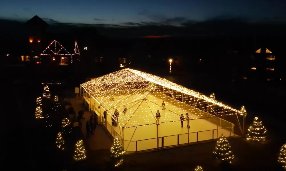 Glice skating rink at night time.