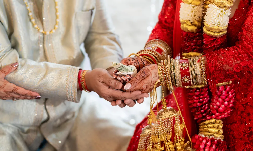 Bride and Groom holding hands