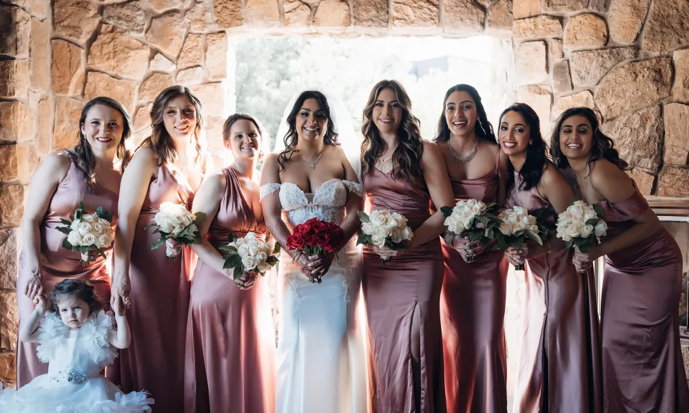 Indian bridesmaids dressed in traditional gowns