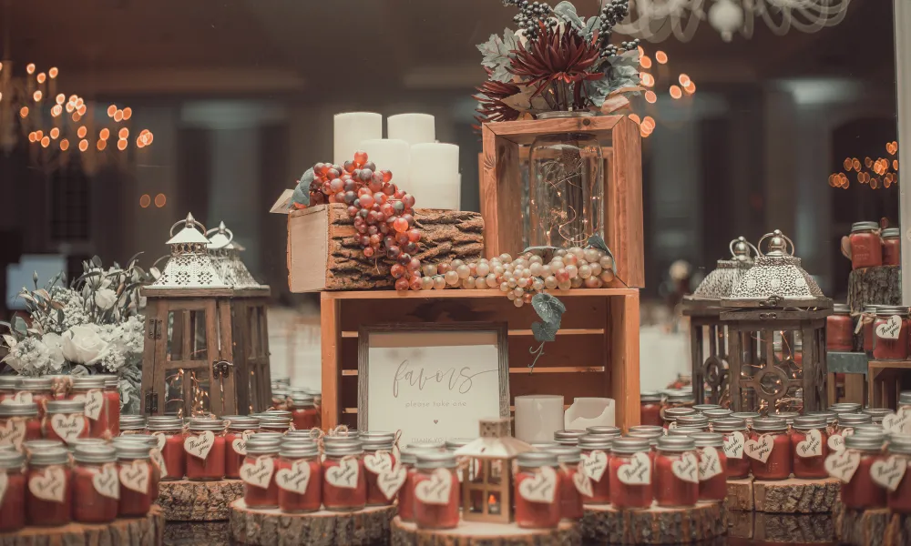 Table of wedding favors in cans. 