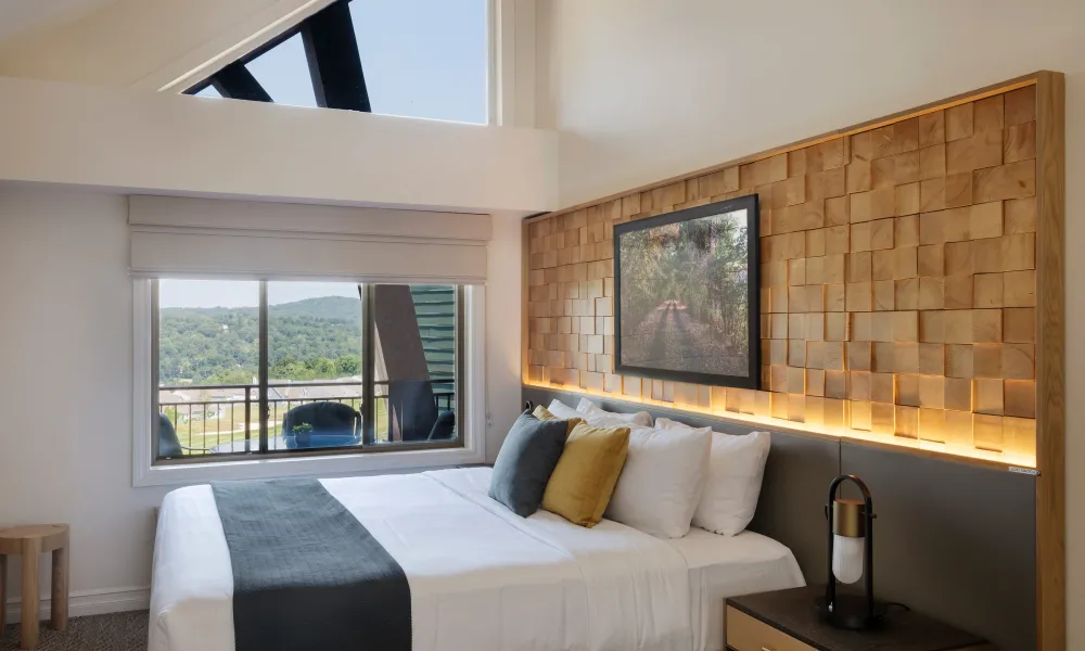 Bedroom in hotel suite at Grand Cascades Lodge