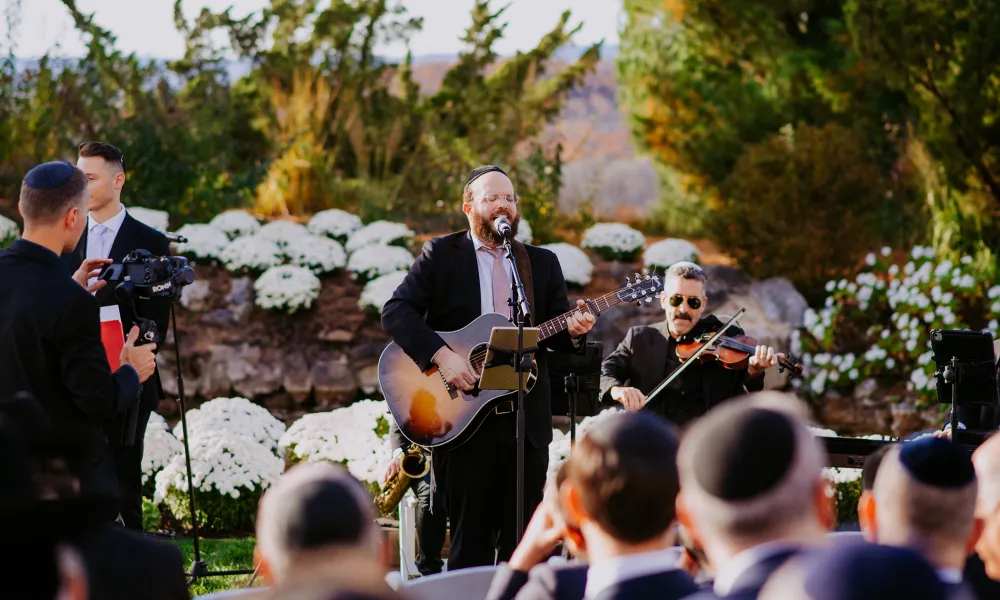 Man singing during wedding.