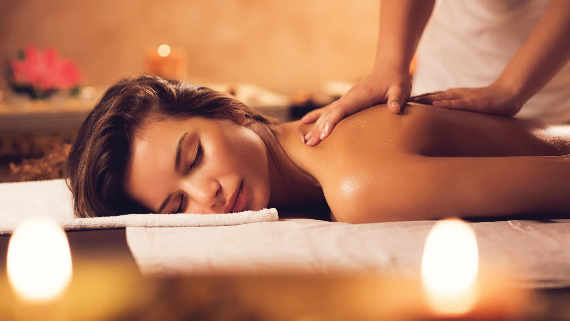 Woman receiving back massage.