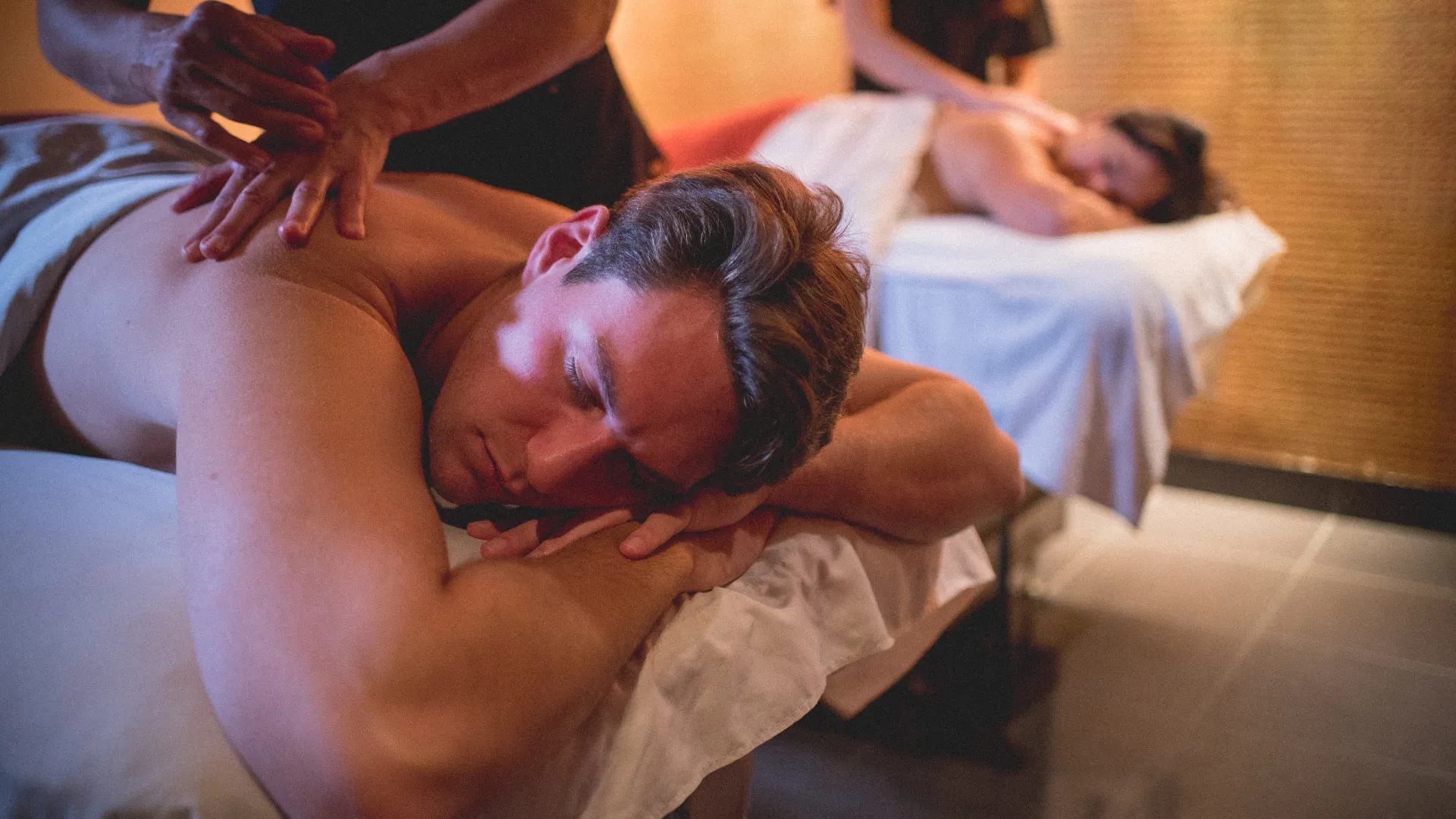 Two people getting massaged.