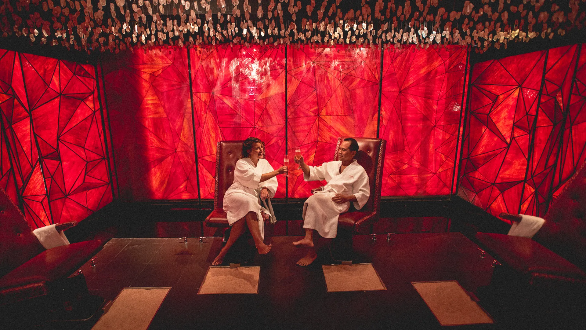 Couple sharing a glass of wine and relaxing at the Reflections Spa at Crystal Springs Resort