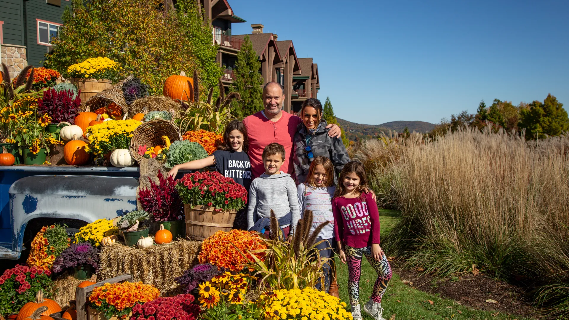 Fall family celebrating Thanksgiving at Grand Cascades Lodge