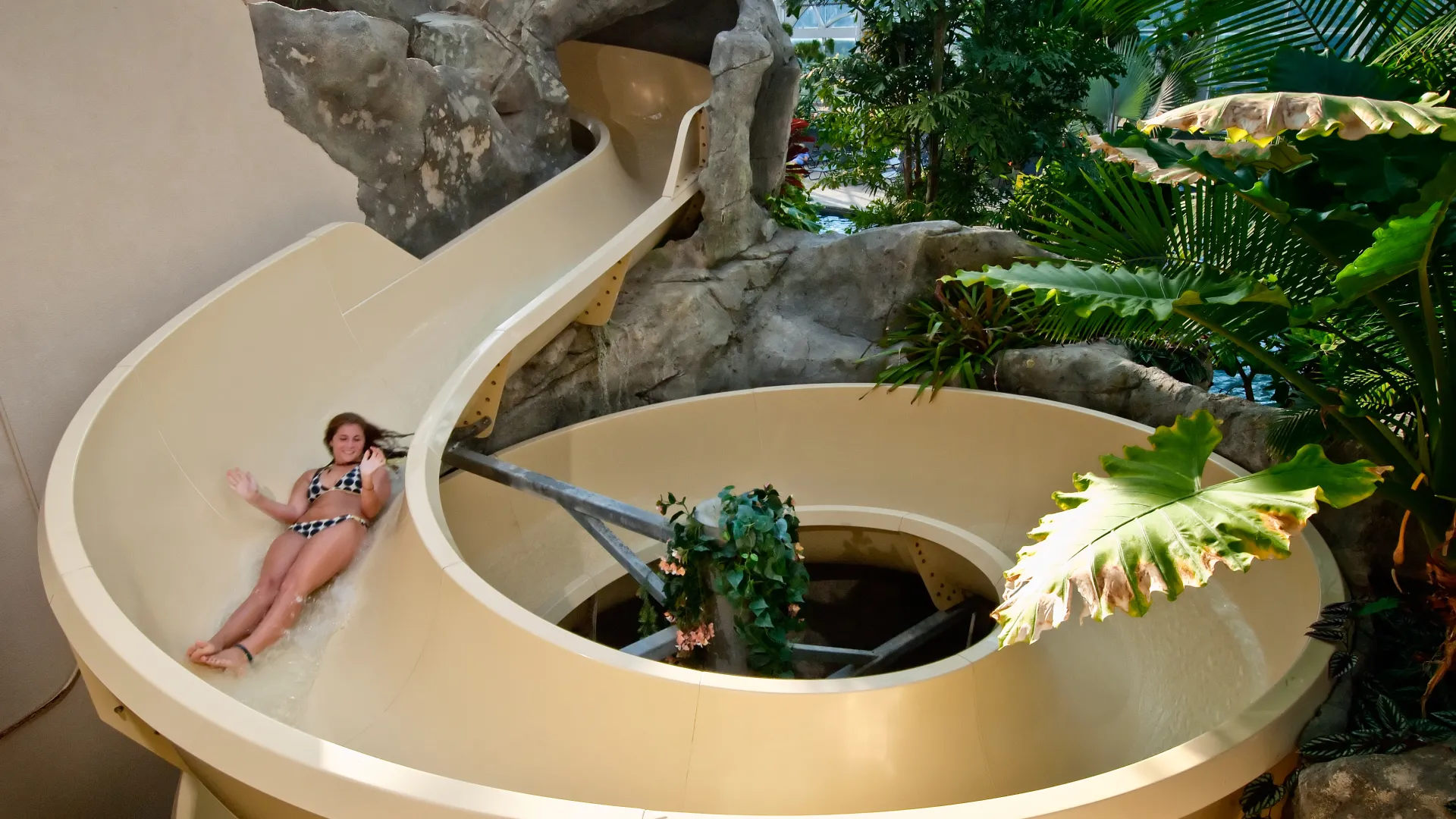 Girl going down Biosphere water slide at Crystal Springs Resort in NJ