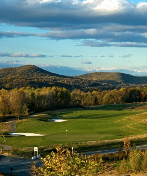 A view at sunset looking over the fairway of Cascades Golf Club at Crystal Springs Resort