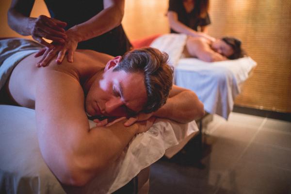 Two people getting massaged.