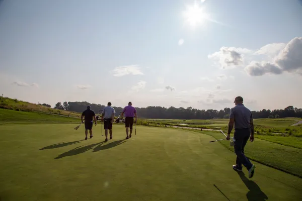 Golfers walking on course at Ballyowen Golf Club