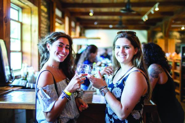 Women toasting at Warwick Valley Winery tasting