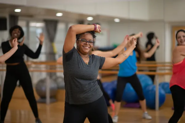 Group of woman doing workout dance class.