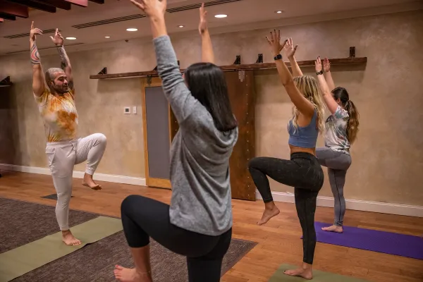 Girlfriends taking part in a yoga class at Crystal Springs Resort