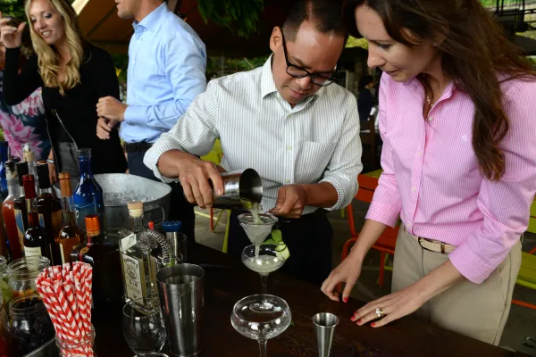 Adults participating in a Mixology teambuilding competition