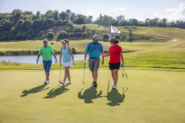 A foursome on the course of Wild Turkey at Crystal Springs Resort