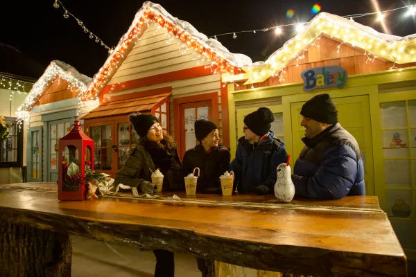 Family drinking hot chocolate at Frosty's Cantina