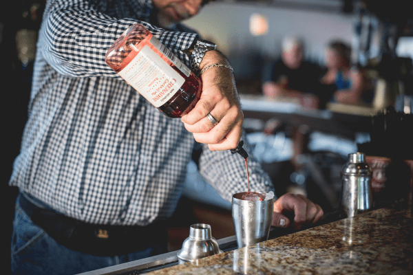 Bartender making a cocktail at Kites Restaurant