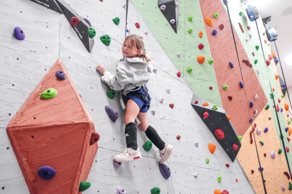 Child rock climbing.